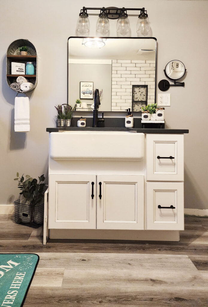farmhouse sink and white bathroom vanity
