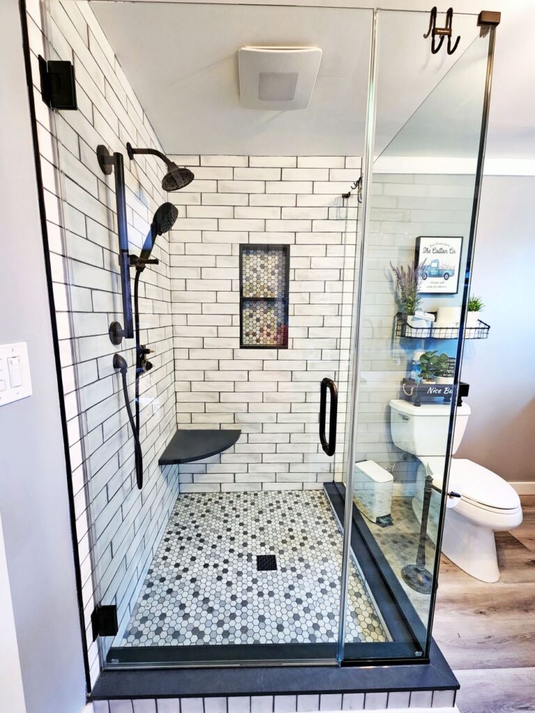 black and white shower with subway wall tiles