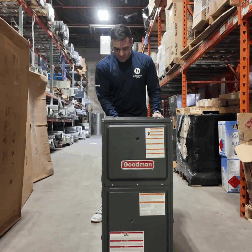 man working on Goodman unit