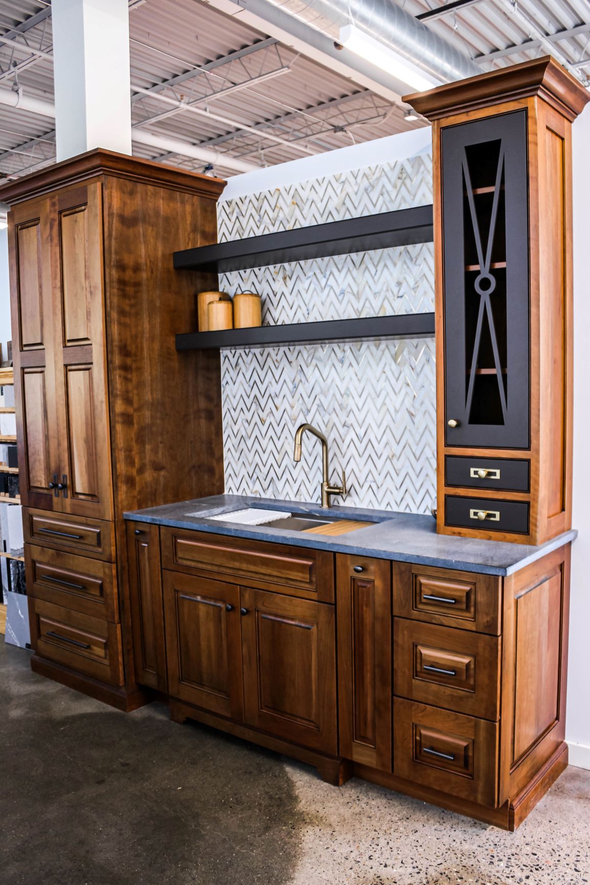 dark wood kitchen with gold accents