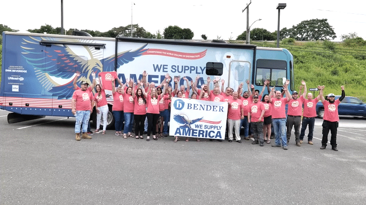 teammates waving proudly